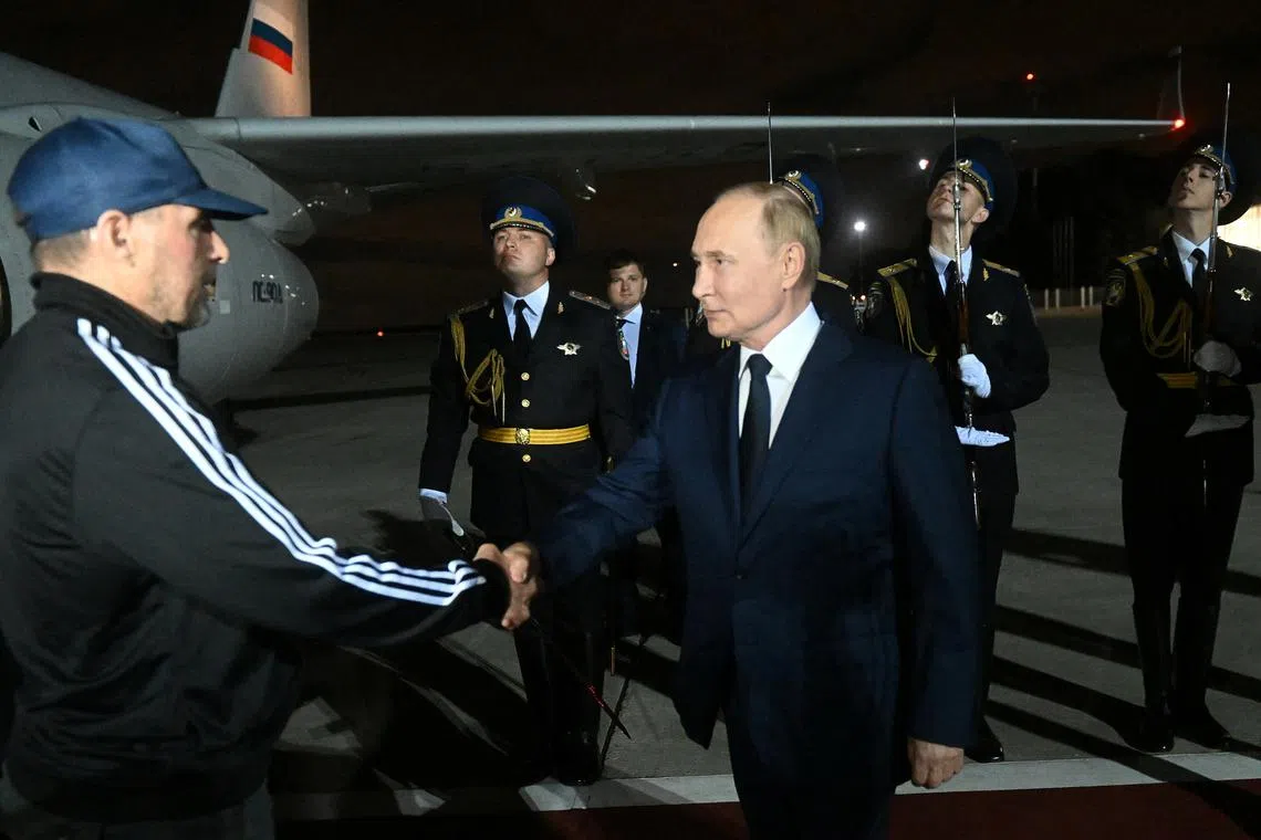 FILE PHOTO: Russia's President Vladimir Putin greets Russian national Vadim Krasikov, who was released in a prisoner exchange between Russia with Western countries, during a welcoming ceremony at Vnukovo International Airport in Moscow, Russia August 1, 2024. Sputnik/Mikhail Voskresensky/Pool via REUTERS/File Photo