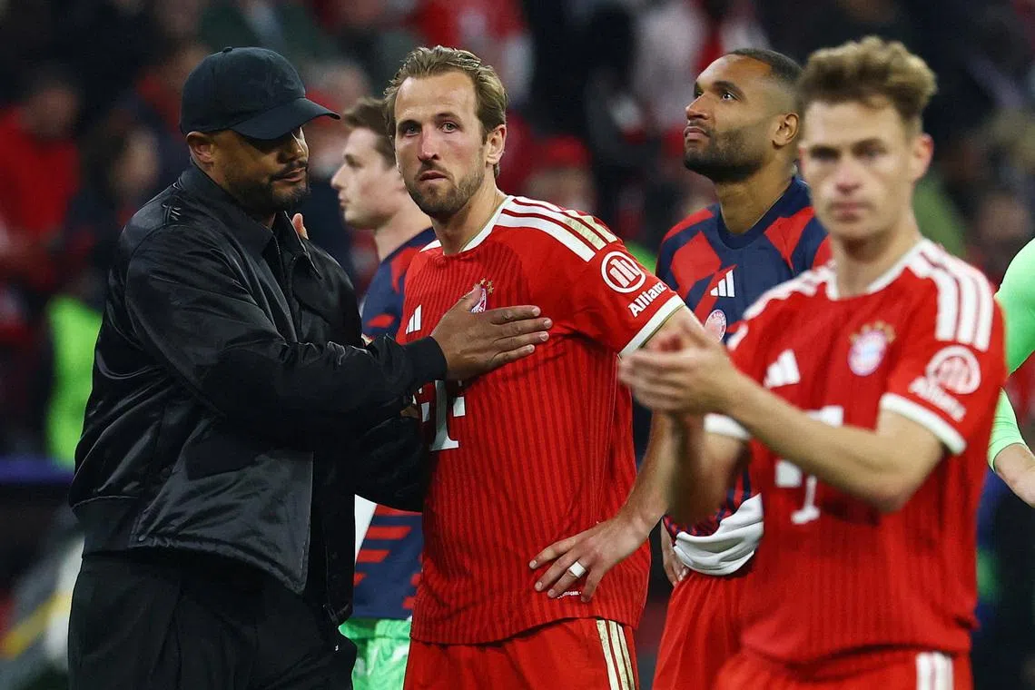 Soccer Football - UEFA Champions League - Semi Final - Second Leg - Bayern Munich v Paris St Germain - Allianz Arena, Munich, Germany - May 6, 2026 Bayern Munich coach Vincent Kompany and Harry Kane look dejected after the match REUTERS/Kai Pfaffenbach