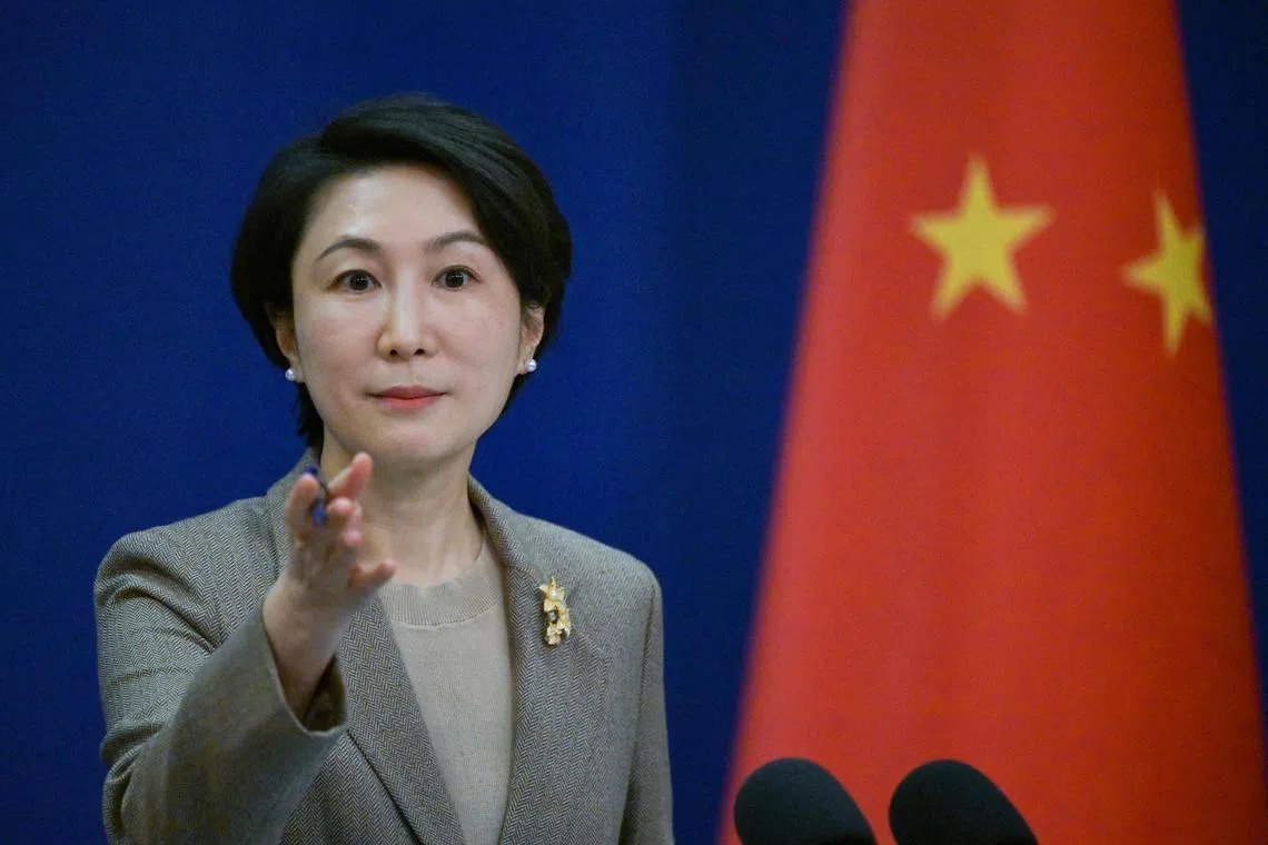 China's Foreign Ministry spokeswoman Mao Ning atends a press conference at the Ministry of Foreign Affairs in Beijing on January 15, 2024. (Photo by Pedro Pardo / AFP)