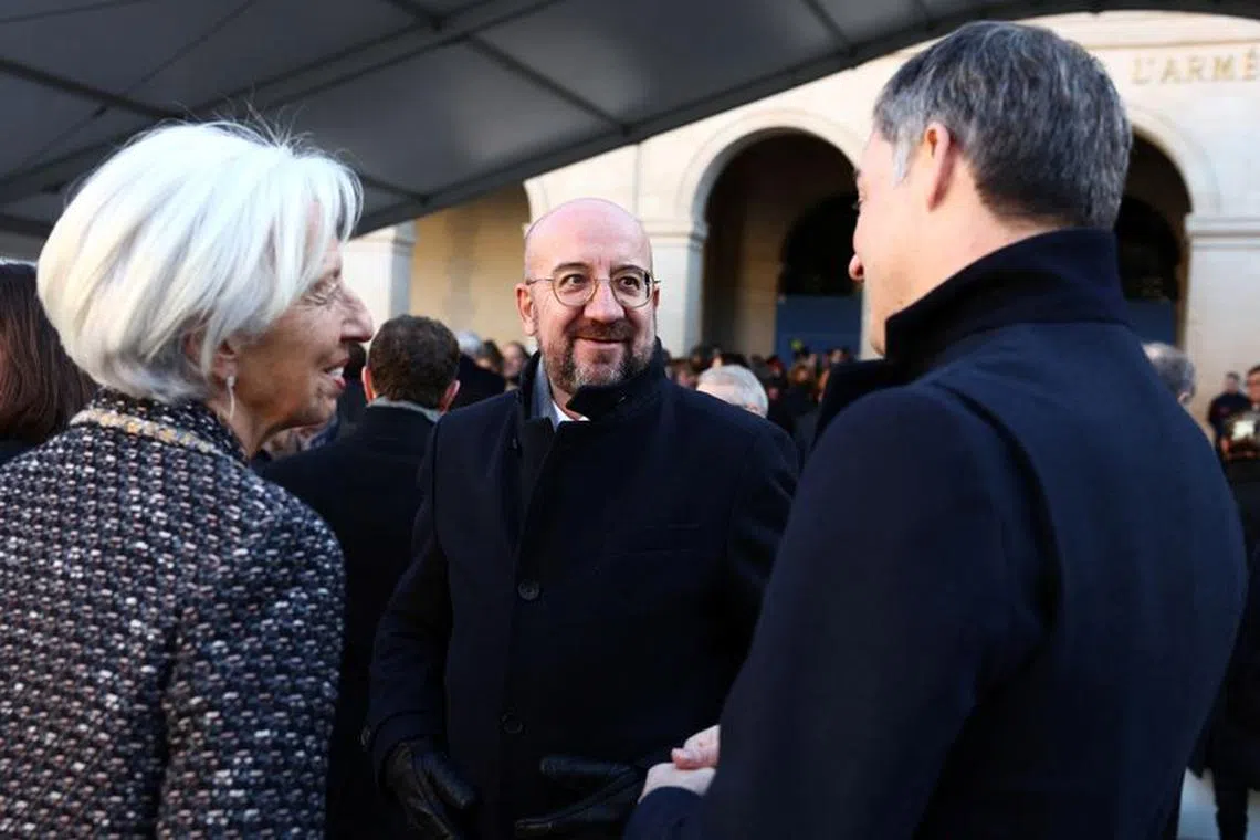 European Central Bank (ECB) President Christine Lagarde talks with European Council President Charles Michel and Belgium's Prime Minister Alexander De Croo before a national tribute ceremony for late French politician and former European Commission President Jacques Delors in the courtyard of the Hotel des Invalides in Paris, France, January 5, 2024. REUTERS/Stephanie Lecocq/Pool