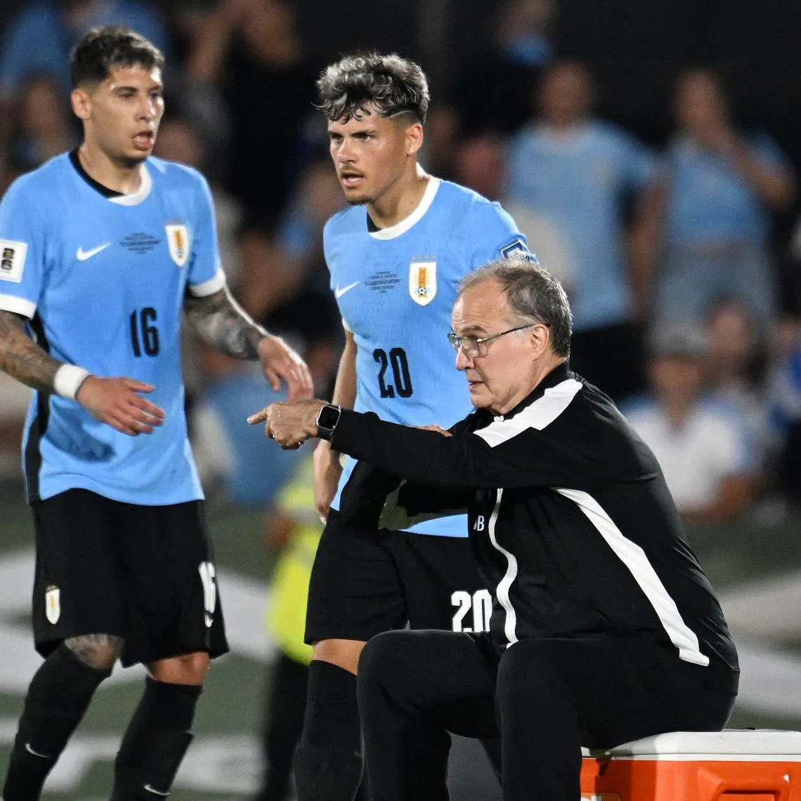 Uruguay head coach Marcelo Bielsa giving instructions to his players during a World Cup qualifier against Argentina.