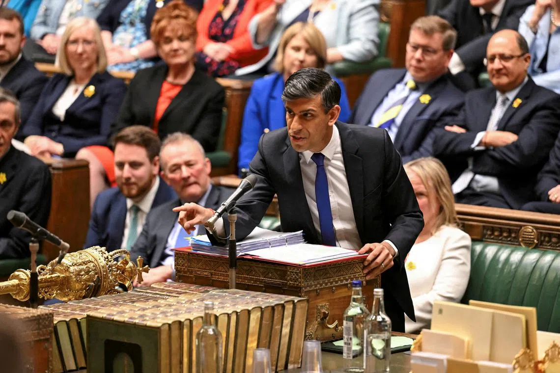 FILE PHOTO: British Prime Minister Rishi Sunak speaks during Prime Minister's Questions at the House of Commons in London, Britain, March 20, 2024. UK Parliament/Maria Unger/Handout via REUTERS/File Photo
