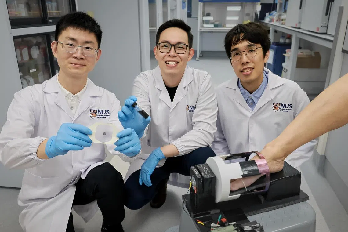 Assistant Professor Andy Tay (centre), Dr Le Zhicheng (left) and Dr Shou Yufeng (right) formed the team that developed the a magnetic wound-healing gel and a Dynamic Magnetic System prototype that speed up healing of diabetic wounds by three times.