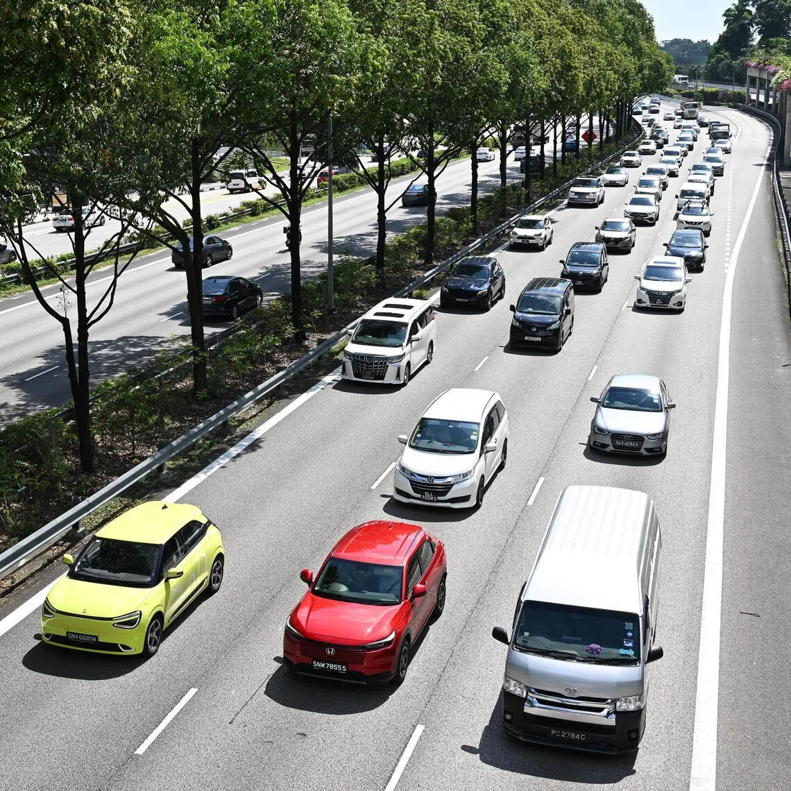 Pixgeneric / Generic photograph of vehicles travelling on the Pan-Island Expressway (PIE) near Trellis Towers on April 12, 2025. Can be used for stories on budget, transport, car, fare, road, LTA, money, and oil. 