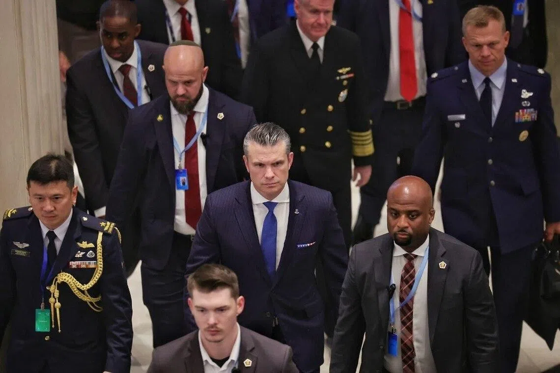 US Defence Secretary Pete Hegseth (centre) on his way to a meeting with Defence Minister Chan Chun Sing on May 29.