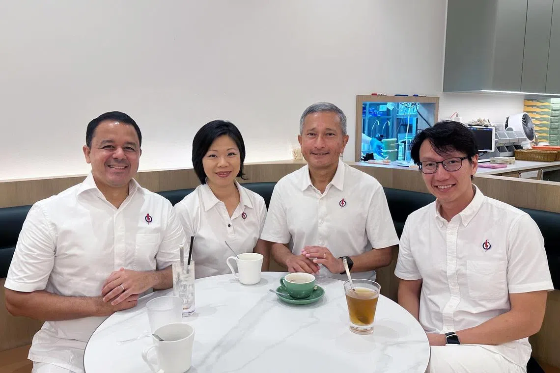 ST PHOTO : Syarafana Binte Muhammad Shafeeq(from left) MPs for Holland-Bukit Timah GRC Mr Christopher de Souza, Ms Sim Ann, Dr Vivian Balakrishnan and Mr Edward Chia at Bukit Panjang Plaza on May 4 during a sit-down chat with The Straits Times