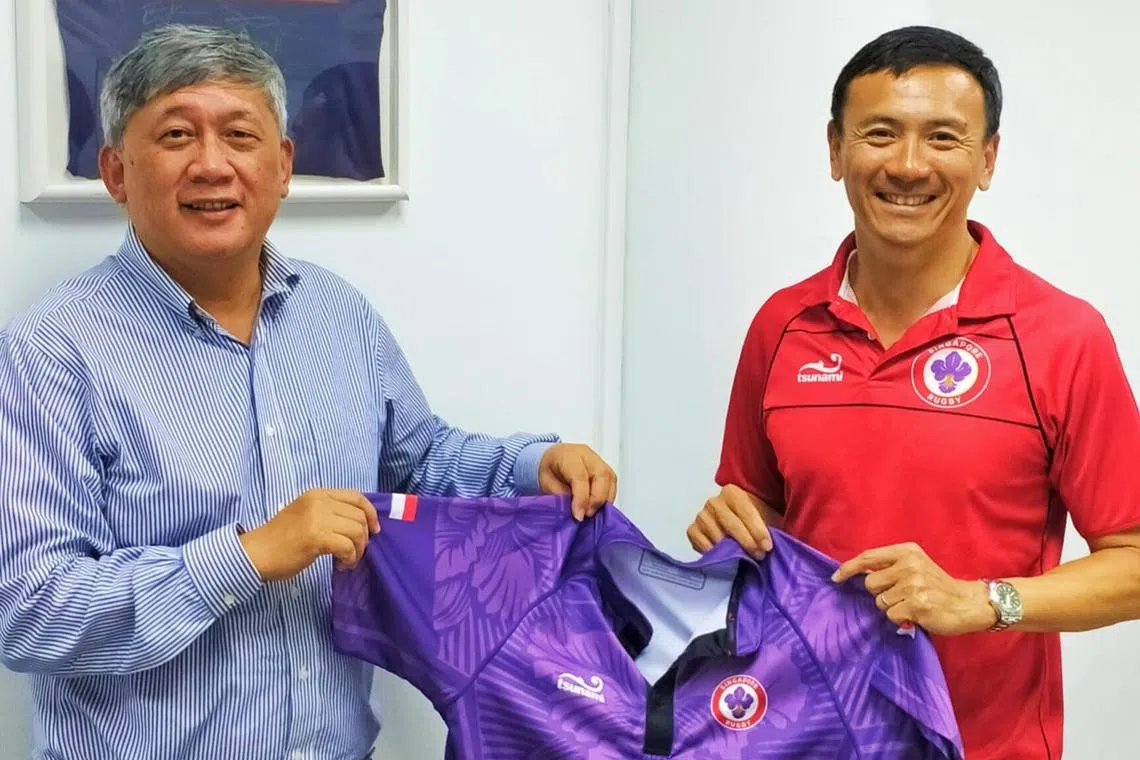 Sunny Seah (left) has taken over as Singapore Rugby Union president from Terence Khoo (right). 

