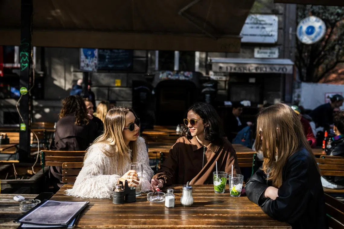 Tisza Party voter Tamara Pohly hangs out with her friends in Budapest, Hungary, April 3, 2026. REUTERS/Marton Monus