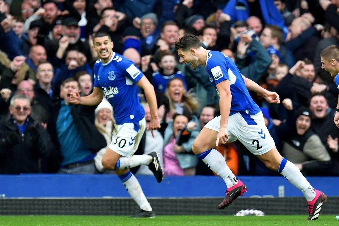 Everton's James Tarkowski (right) reacts after scoring in the 1-0 win over Arsenal.