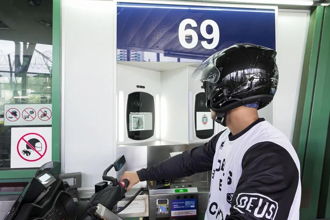 Under the trial, motorcyclists entering Singapore can use facial recognition instead of fingerprint scanning to clear immigration.