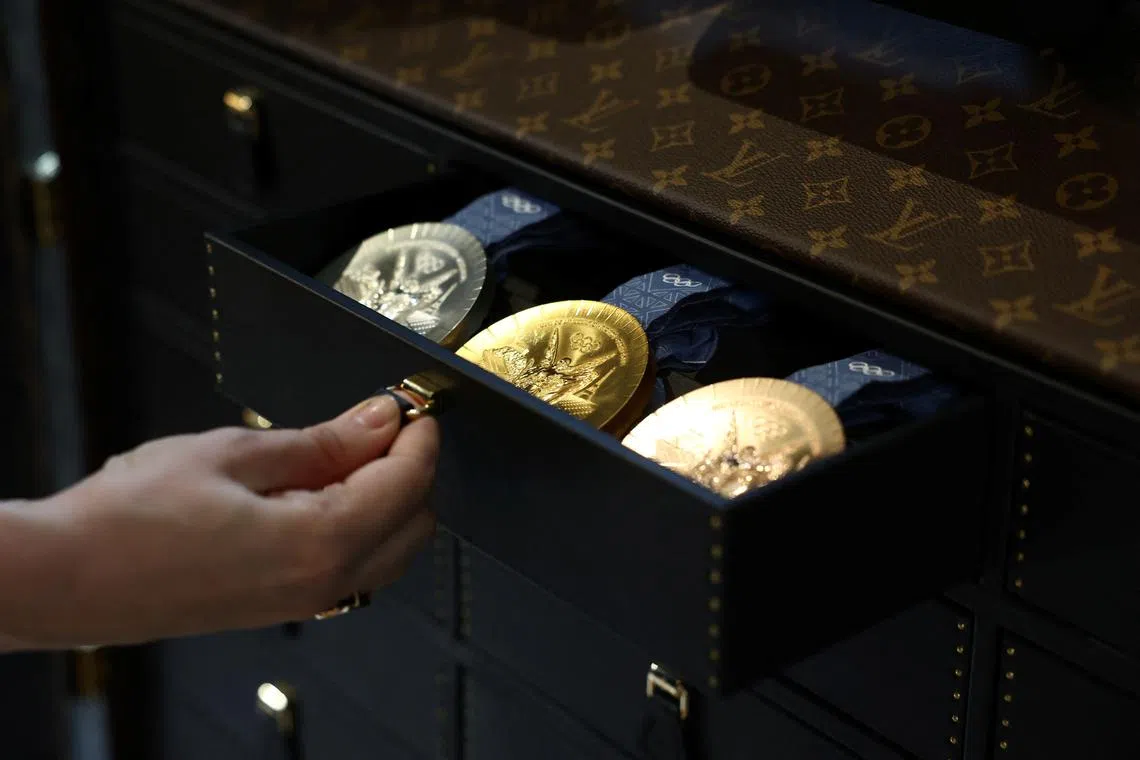 Olympics - Louis Vuitton makes custom trunks for Paris Games flames ...