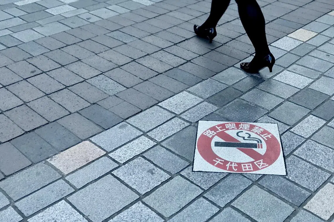 A “No Smoking On The Streets” sign in Tokyo’s Chiyoda ward, the first of the Japanese capital’s 23 wards to outlaw public smoking in 2002, with offenders facing fines of 2,000 yen (S$25).
