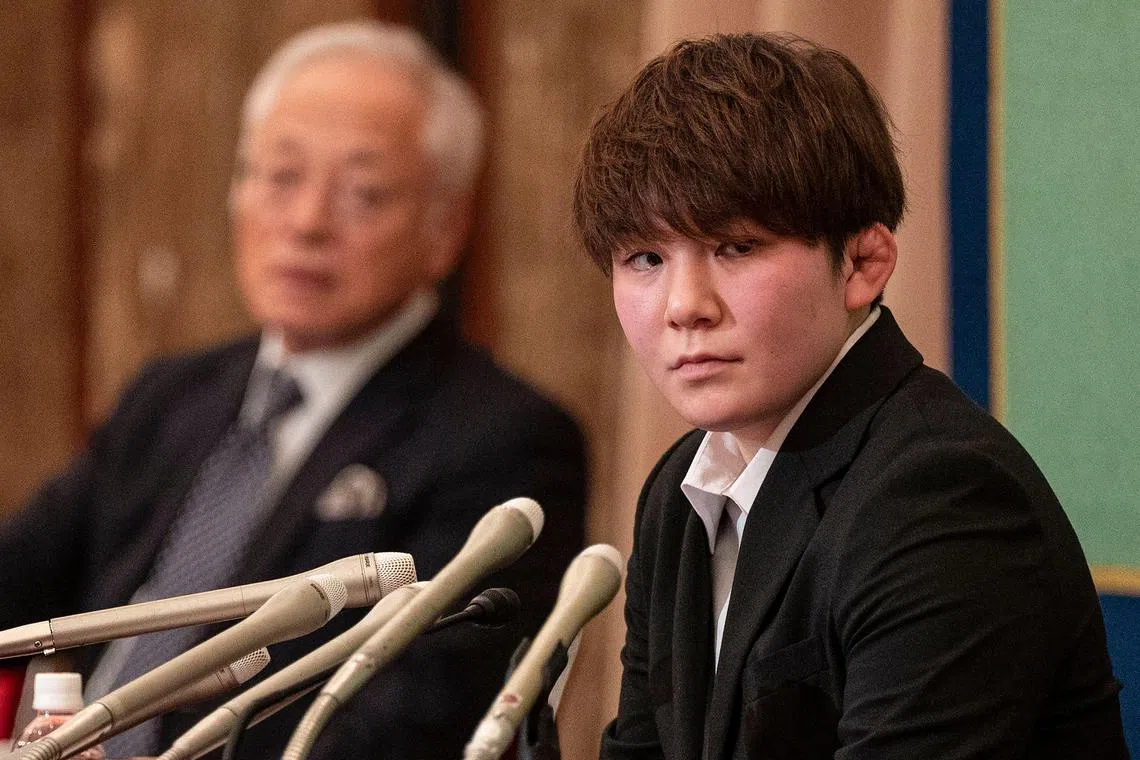 Japanese former soldier Rina Gonoi (R) at a press conference at the National Press Club in Tokyo on January 30, 2023.