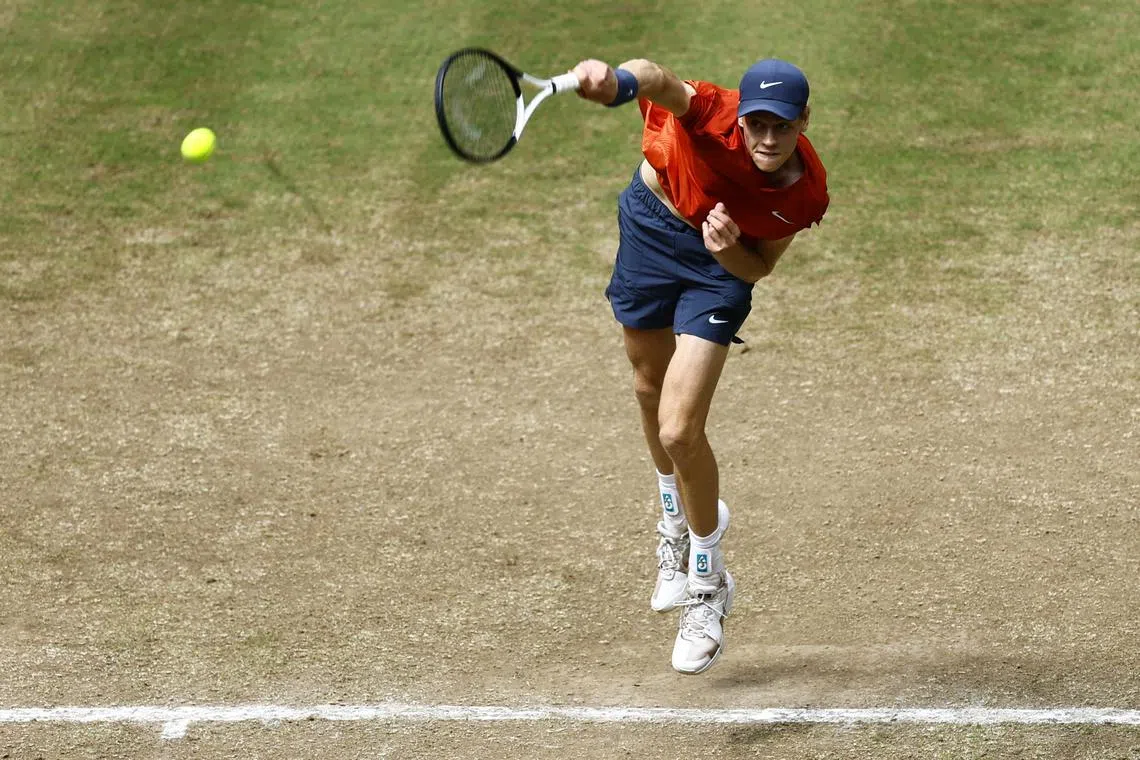 FILE PHOTO: Tennis - Halle Open - OWL Arena, Halle, Germany - June 23, 2024 Italy's Jannik Sinner in action during the final against Poland's Hubert Hurkacz REUTERS/Leon Kuegeler