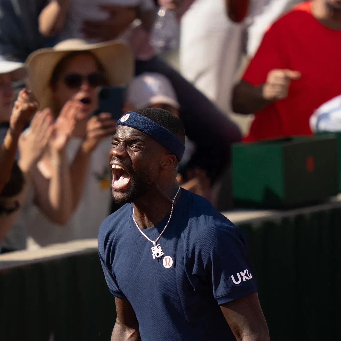 May 28, 2026; Paris, France; Frances Tiafoe of the United States celebrates winning his match against Hubert Hurkacz of Poland on day five at Stade Roland Garros. Mandatory Credit: Susan Mullane-Imagn Images
