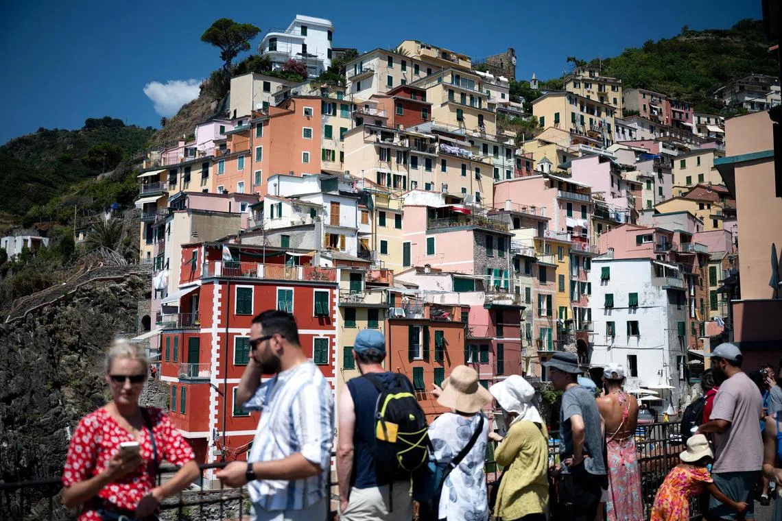 In Riomaggiore, a village in Cinque Terre, the tourist boom has upended life for many residents.