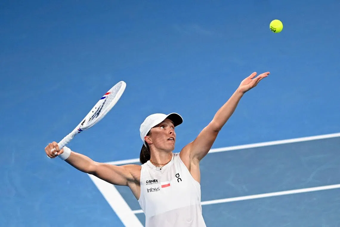 Tennis - United Cup - Final - Poland v Switzerland - Ken Rosewall Arena, Sydney, Australia - January 11, 2026 Poland's Iga Swiatek in action during the singles match against Switzerland's Belinda Bencic REUTERS/Jeremy Piper