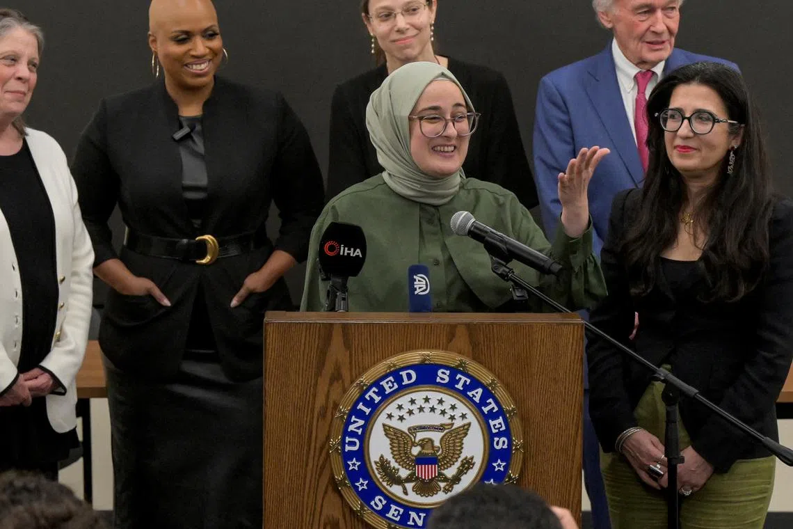 FILE PHOTO: Tufts University student Rumeysa Ozturk, of Turkey, speaks at a press conference at Boston Logan International Airport after she was released on a judge's order after spending over six weeks in an immigration detention center in Louisiana, in Boston, Massachusetts, U.S. May 10, 2025.  REUTERS/Faith Ninvaggi/File Photo