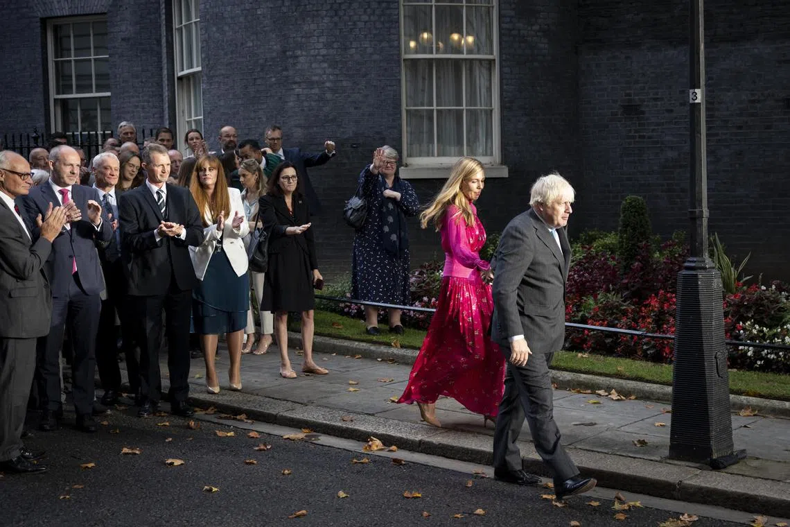 epa10364981 epa10163168 Outgoing British Prime Minister Boris Johnson (R) and his wife Carrie Johnson (2-R) leave Downing Street after a farewell speech in London, Britain, 06 September 2022. Johnson will formally relinquish his role to Queen Elizabeth at Balmoral before the new Prime Minister is appointed.  EPA-EFE/TOLGA AKMEN  EPA-EFE/TOLGA AKMEN
