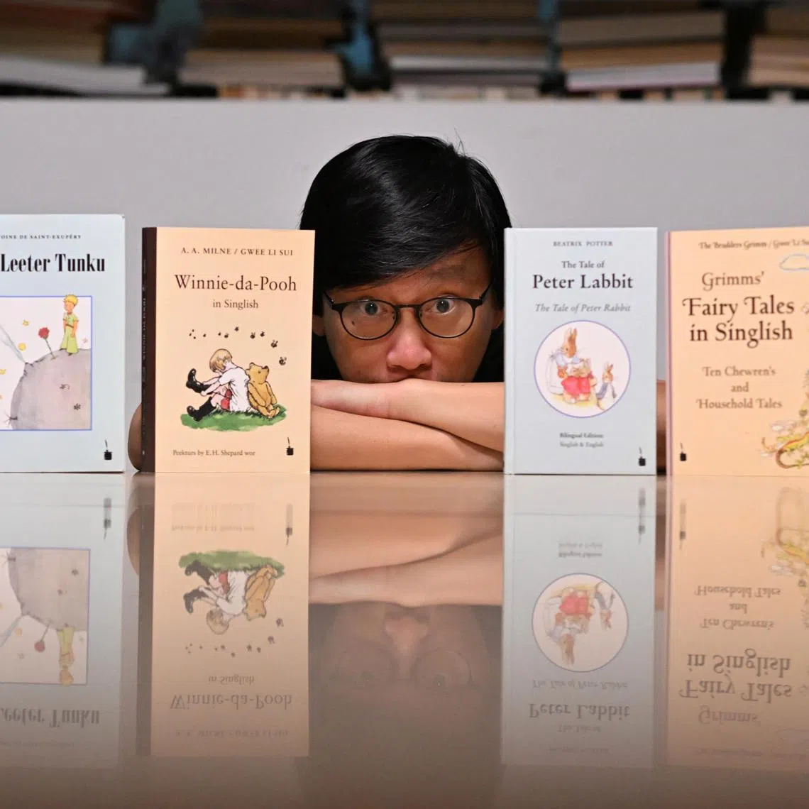 Dr Gwee Li Sui has translated four children's classics into Singlish and his latest book is a translation of A. A. Milne's Winnie-the-Pooh.  