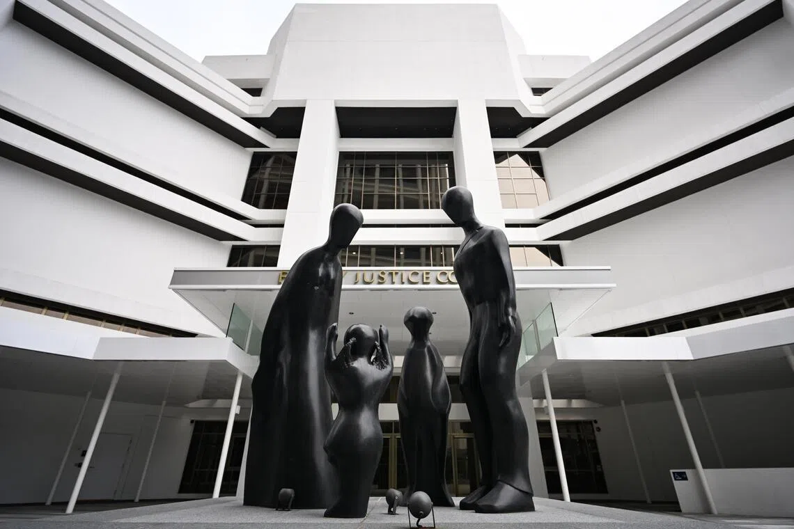 A sculpture titled, Family by Brother Joseph McNally outside the Family Justice Courts, which is the State Courts' old building in Havelock Square on March 4, 2026.