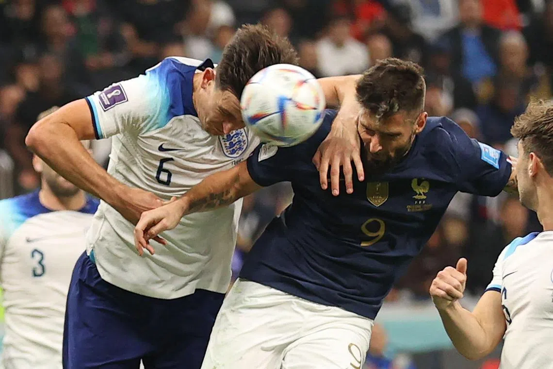 Olivier Giroud scoring his team's second goal past England's defender Harry Maguire during the Qatar 2022 World Cup quarter-final football match between England and France at the Al-Bayt Stadium in Al Khor, north of Doha, on Saturday. France won 2-1.
