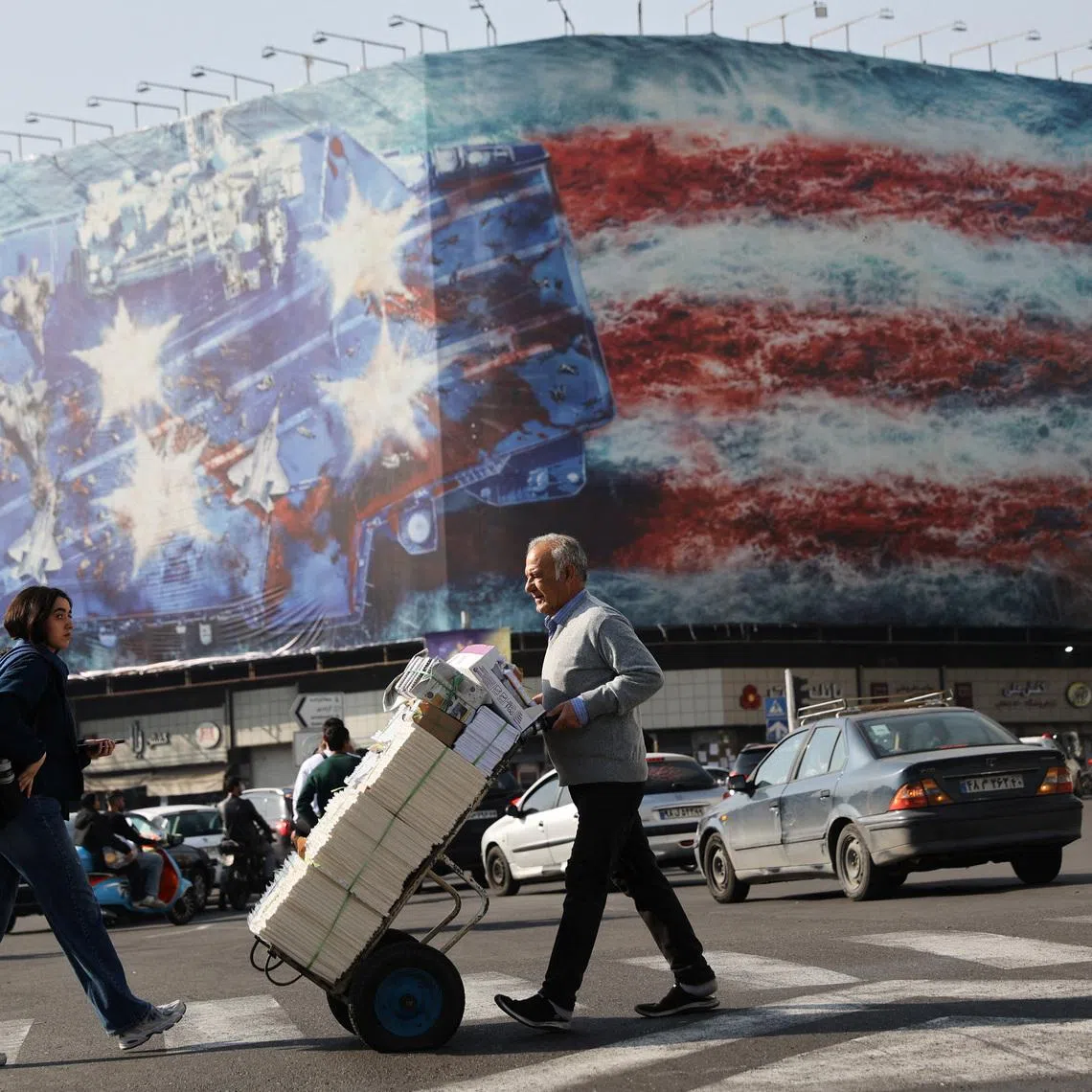 An anti-US billboard in Tehran. US President Donald Trump on Feb 19 gave Tehran a deadline of 10-15 days to make a nuclear deal or face "really bad things".