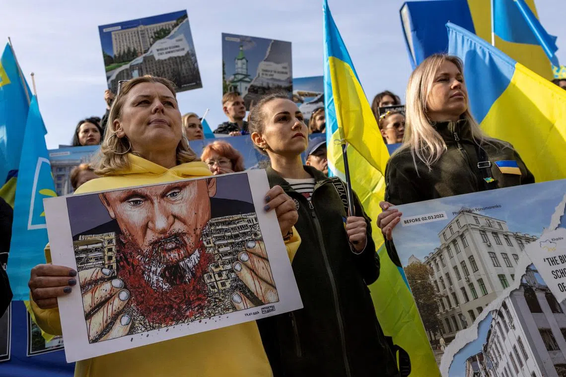 People attend a protest to mark the one-year anniversary of the Russian invasion of Ukraine, in Istanbul, Turkey, on Feb 24, 2023.