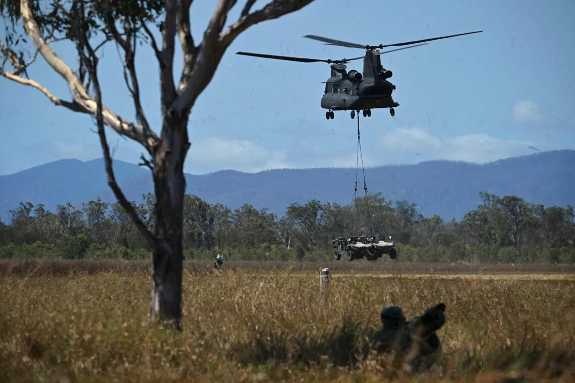 ST20251024_202596400359 Kua Chee Siong/ pixwallaby/
A Chinook Helicopter departing from the pick-up zone after a trooplift and underslung operation at the 101 SQN/Air Terminal, during Exercise Wallaby (XWB) at Shoalwater Bay Training Area (SWBTA) in Queensland, Australia on Oct 26, 2025.
This year marks the 35th edition of XWB. Around 6,500 personnel from the Singapore Army, Republic of Singapore Air Force (RSAF) and Digital Intelligence Service (DIS) will be participating in the exercise.