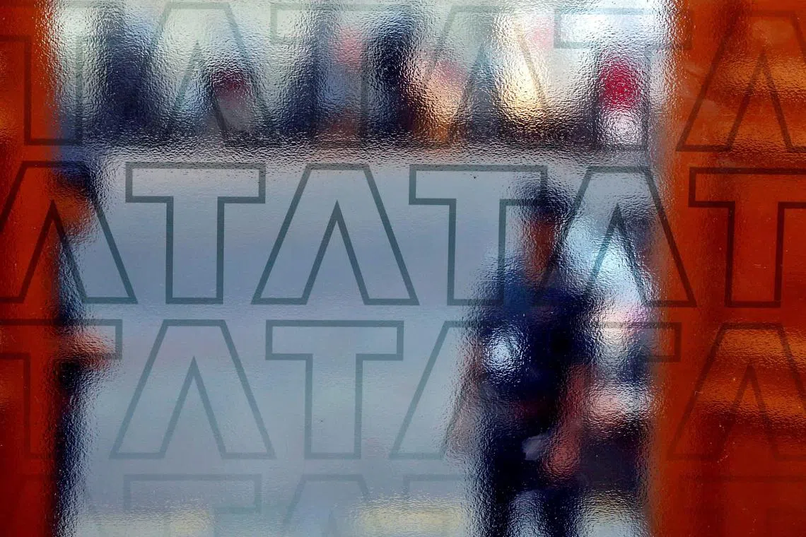 FILE PHOTO: A private security guard stands at the exit gate of the headquarters of Tata Consultancy Services (TCS) in Mumbai, India October 13, 2016. REUTERS/Shailesh Andrade/File Photo
