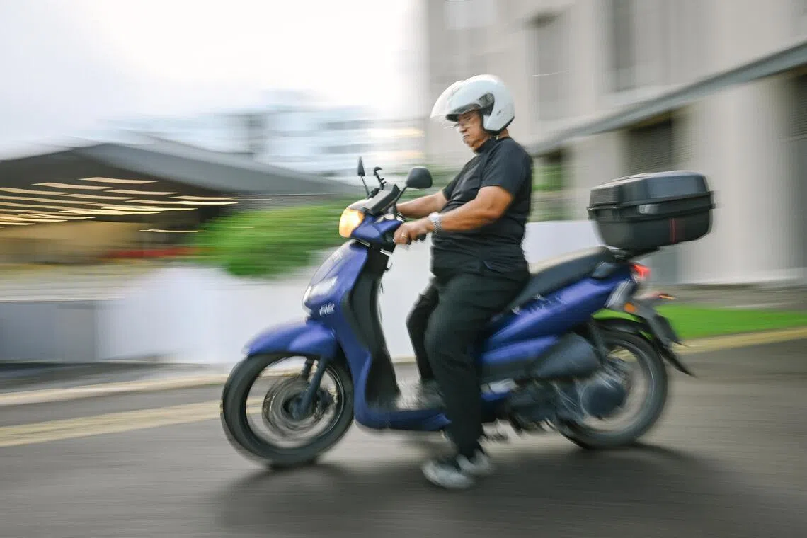 Anthony Png, 80, on his scooter at Temasek Polytechnic, where he is pursuing his second diploma.