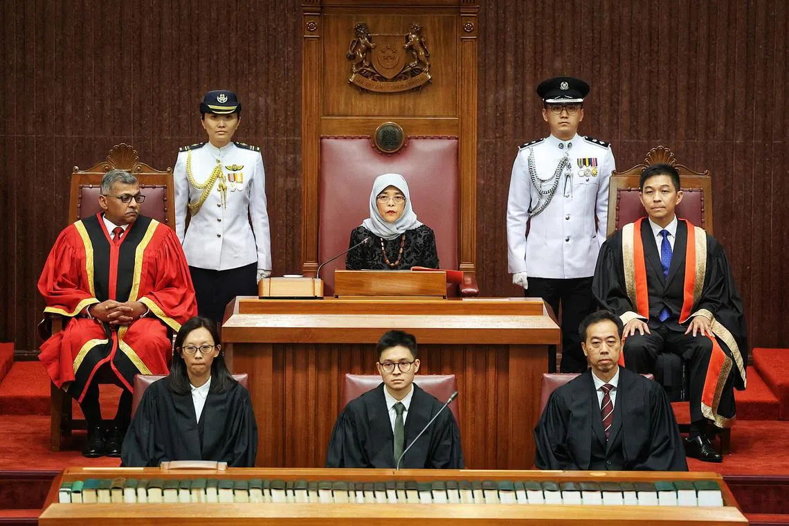 President Halimah Yacob, flanked by Speaker of Parliament Tan Chuan-jin (right) and Chief Justice Sundaresh Menon (left), addressing Parliament on April 10, 2023.
