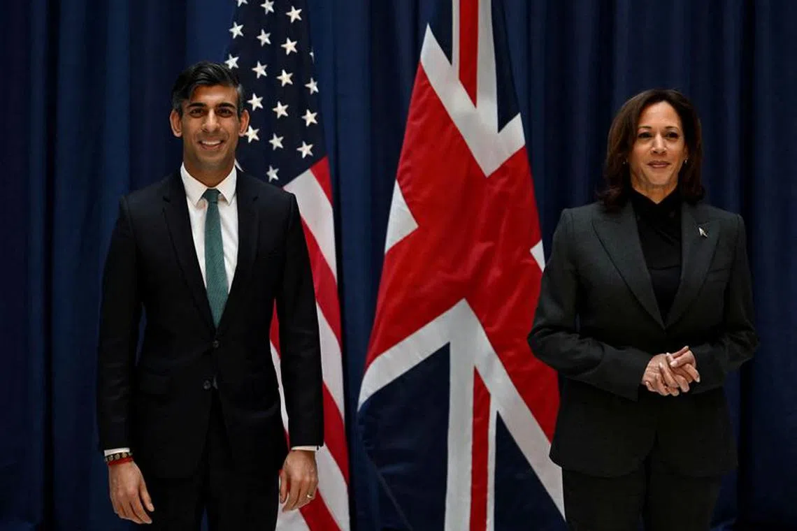 FILE PHOTO: Britain's Prime Minister Rishi Sunak and U.S. Vice President Kamala Harris pose as they meet at the Munich Security Conference (MSC) in Munich, Germany, February 18, 2023. Ben Stansall/Pool via REUTERS/File Photo