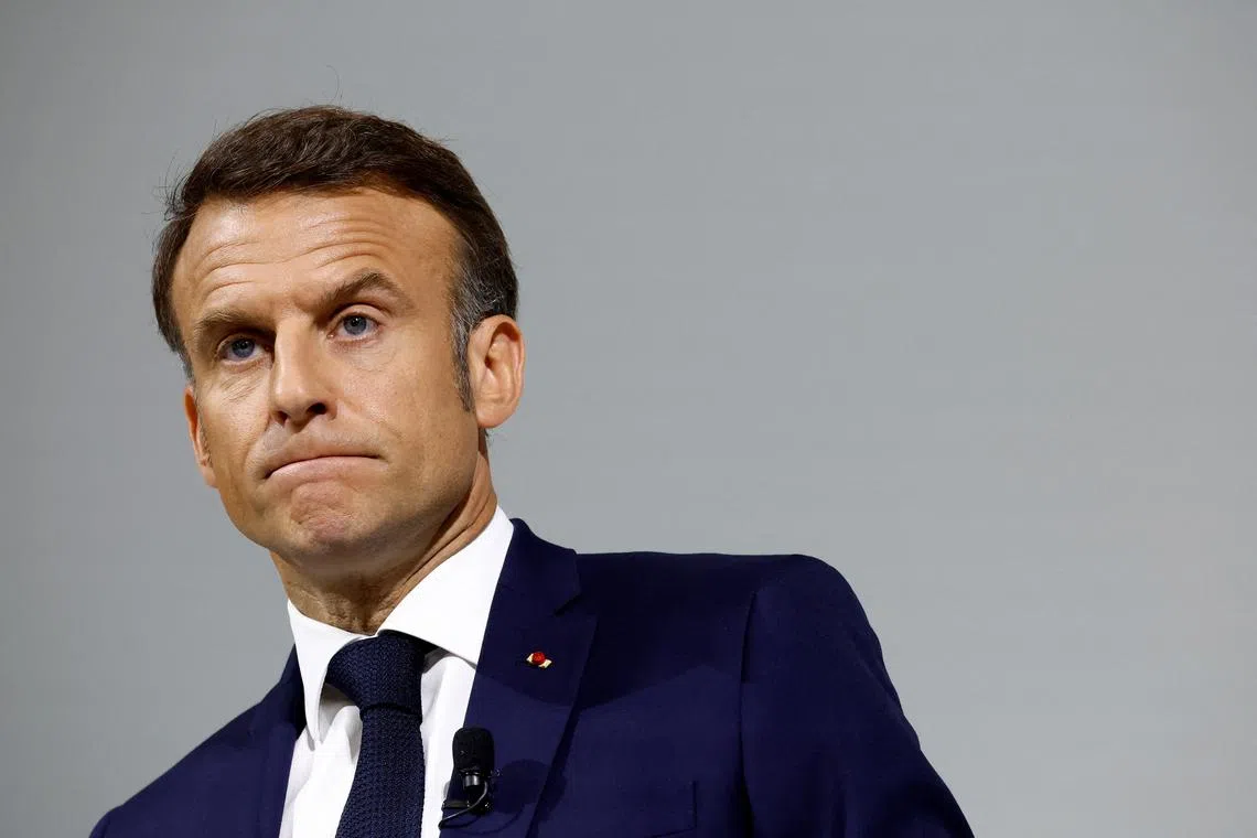 French President Emmanuel Macron reacts during a press conference about the priorities of his Renaissance party and its allies ahead of the early legislative elections in Paris, France, June 12, 2024. REUTERS/Stephane Mahe/ File Photo