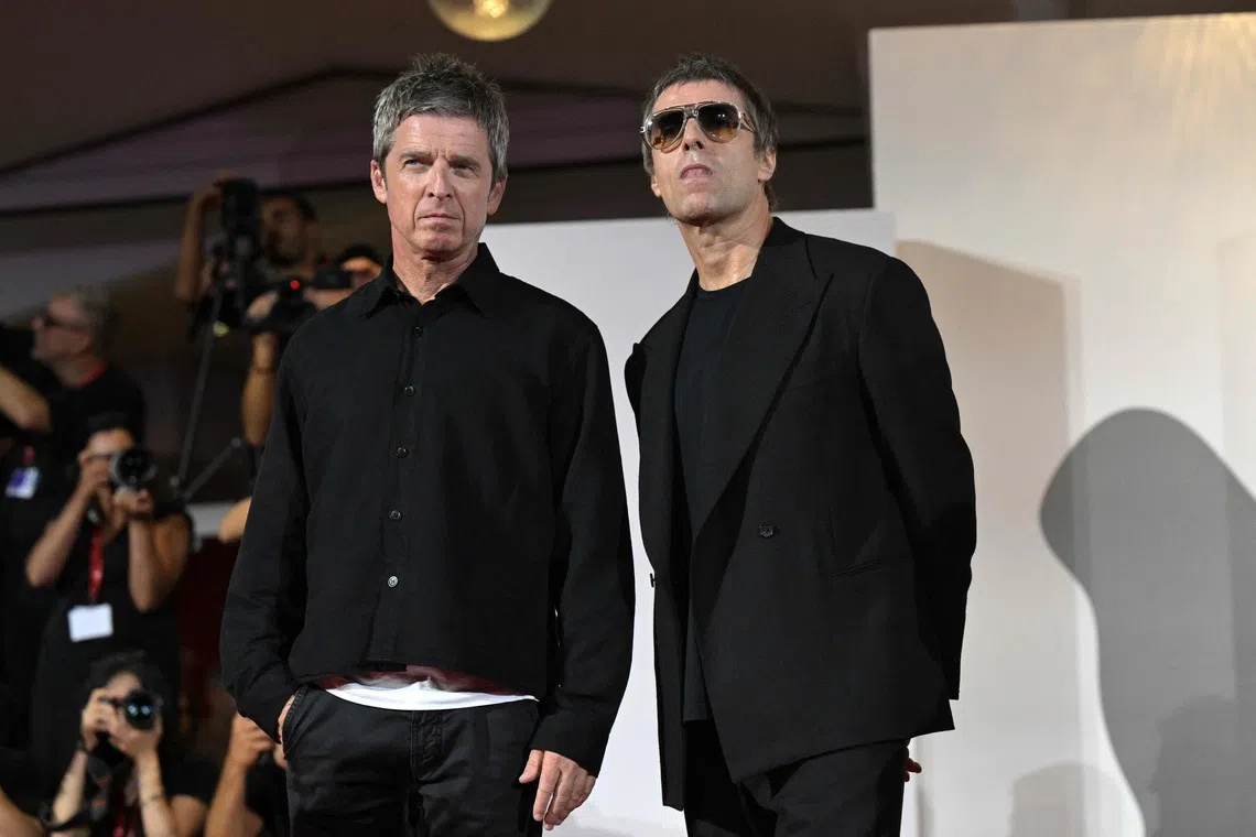 Brothers Noel (left) and Liam Gallagher of Oasis at the Venice Film Festival on Sept 5 ahead of a documentary chronicling the band’s reunion tour.