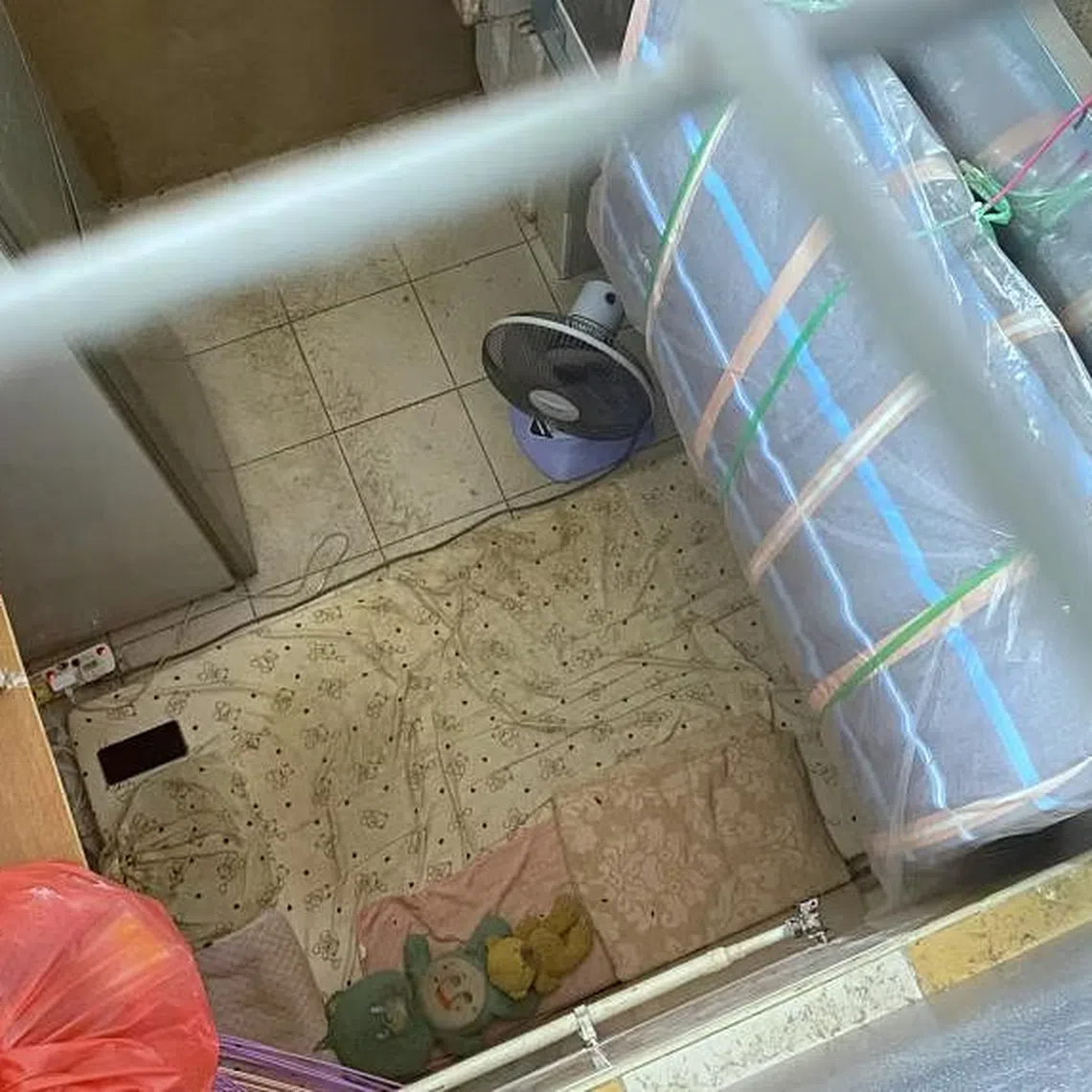 Foldable mattresses, two soft toys, and a fan were in one of three units rented by the girl's father.