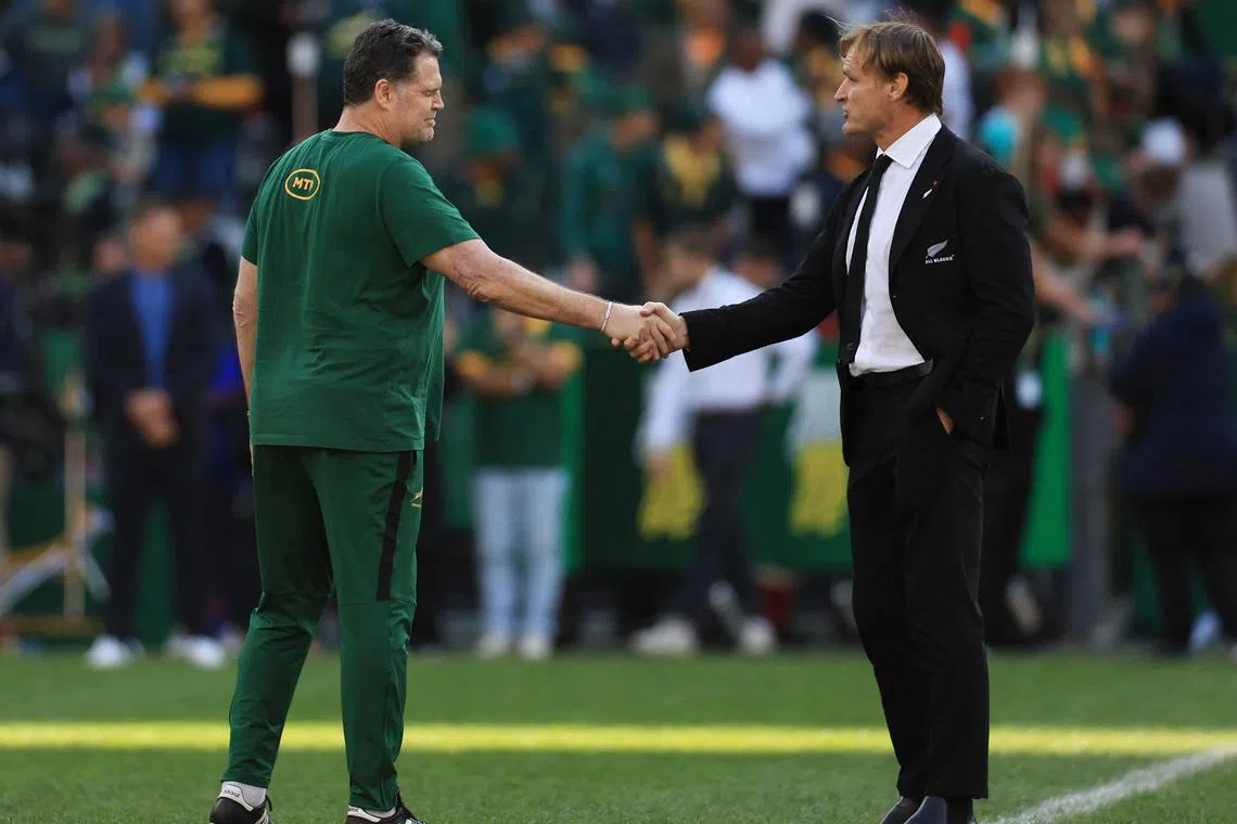 Rugby Union - Rugby Championship - South Africa v New Zealand - Cape Town Stadium, Cape Town, South Africa - September 7, 2024 New Zealand coach Scott Robertson shakes hands with South Africa coach Rassie Erasmus after the match REUTERS/Esa Alexander