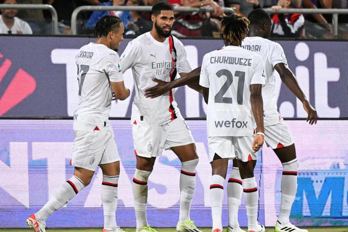 FILE PHOTO: Soccer Football - Serie A - Cagliari v AC Milan - Sardegna Arena, Cagliari, Italy - September 27, 2023 AC Milan's Ruben Loftus-Cheek celebrates scoring their third goal with teammates REUTERS/Alberto Lingria/File Photo