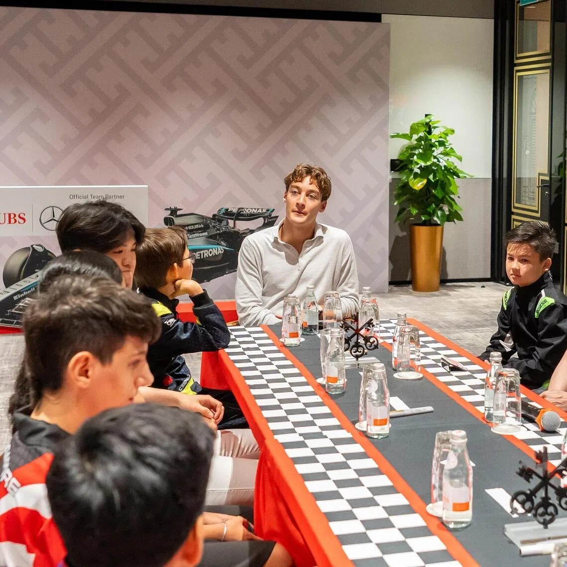 Mercedes driver and UBS Global Brand Ambassador, George Russell hosting a round table with young racing talents in Singapore from Motor Sports Singapore together with Young Jin Yee, Co-Head UBS Global Wealth Management Asia Pacific and Country Head UBS Singapore.

Credit: UBS
