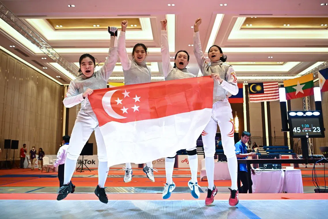 (From left) Maxine Wong, Tiffany Seet, Tay Yu Ling and Cheung Kemei after winning the fencing women foil team final on May 15.