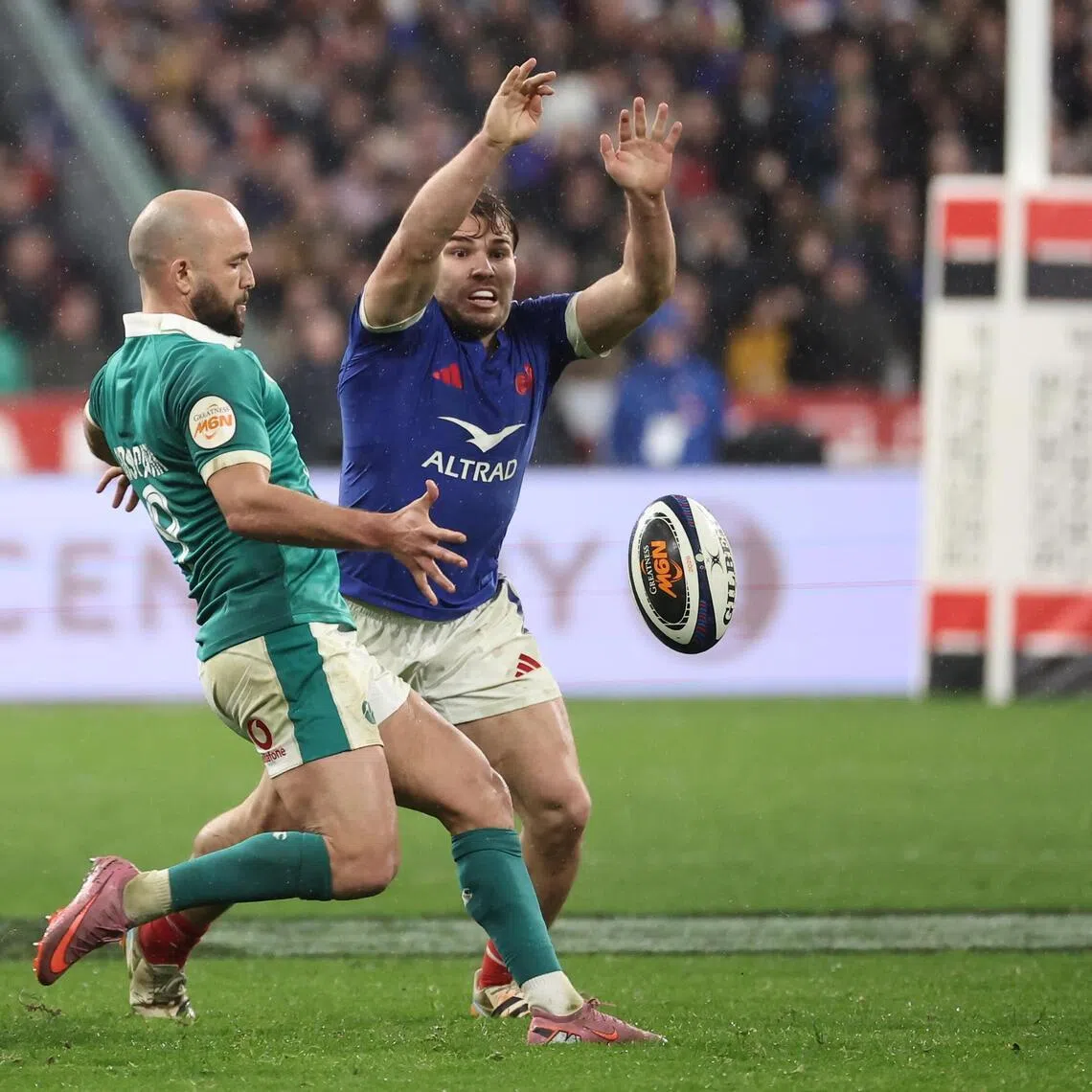 Antoine Dupont of France and Jamison Gibson-Park of Ireland in action during the Six Nations rugby match.