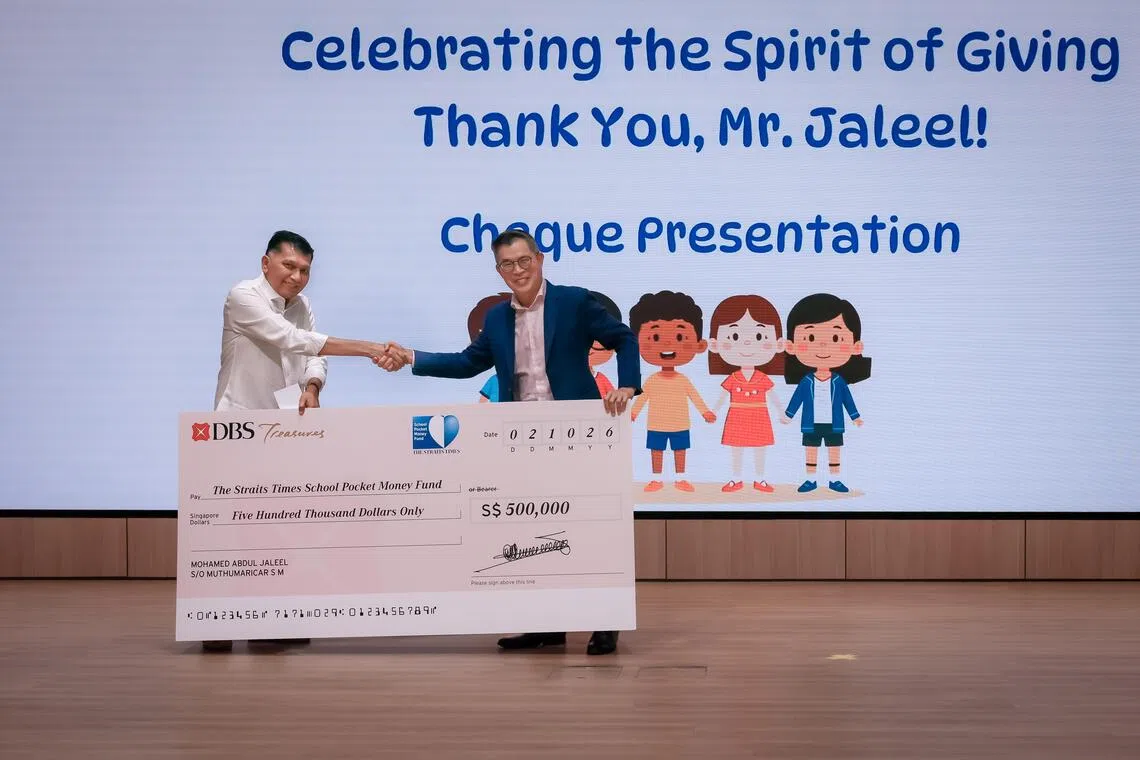 MES Group founder and chief executive Mohamed Abdul Jaleel presents a $500,000 cheque to The Straits Times School Pocket Money Fund chairman Jaime Ho at the fund's annual appreciation day on Oct 2, 2026.