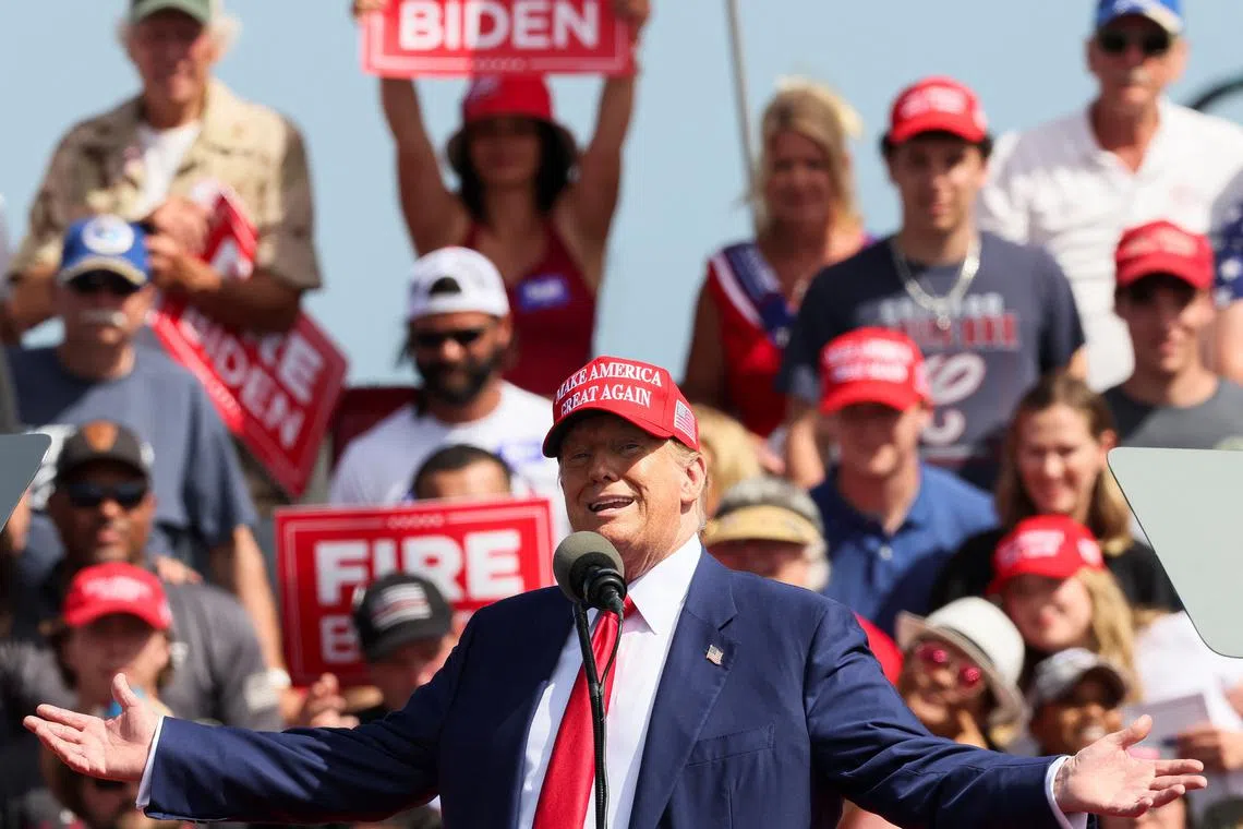 Former U.S. President and Republican presidential candidate Donald Trump speaks during his  campaign event, in Racine, Wisconsin, U.S. June 18, 2024. REUTERS/Brendan McDermid