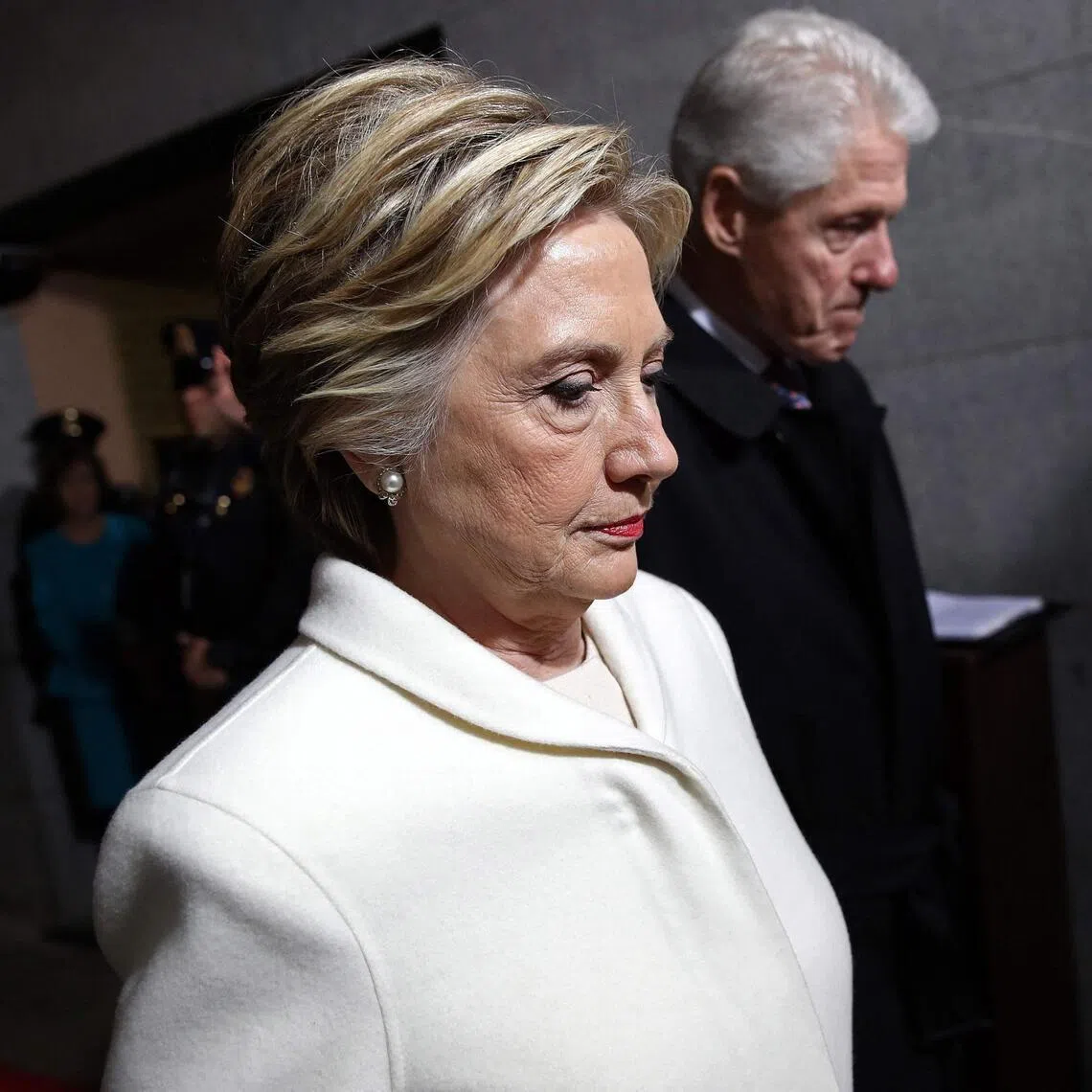 (FILES) Former Democratic presidential nominee Hillary Clinton and former US President Bill Clinton arrive on the West Front of the US Capitol on January 20, 2017 in Washington, DC, before the swearing-in ceremony of US President-elect Donald Trump. Former US secretary of state Hillary Clinton is to testify behind closed doors on February 26, 2026, before a congressional committee investigating the late convicted sex offender Jeffrey Epstein and his accomplice Ghislaine Maxwell. Former president Bill Clinton is scheduled to answer questions the following day from the Republican-led House Oversight Committee about his relations with Epstein, who died in a New York jail cell in 2019 while awaiting trial. (Photo by Win McNamee / POOL / AFP)