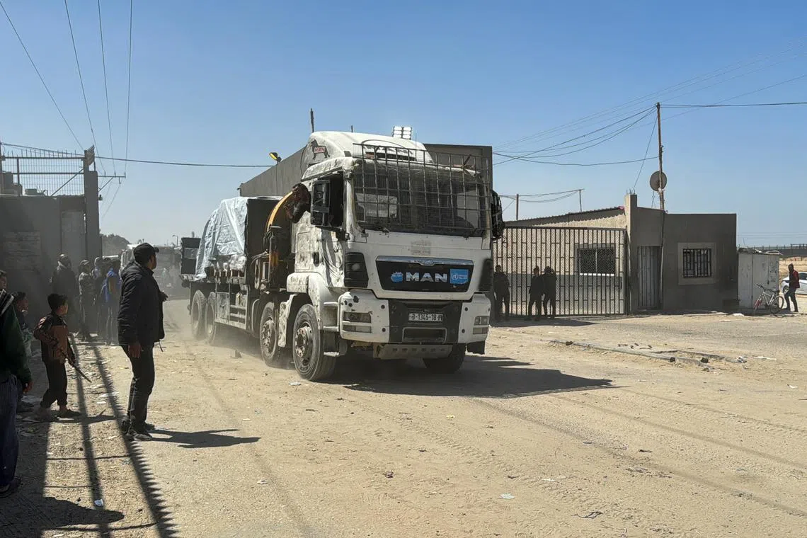 FILE PHOTO: A truck carrying aid enters Gaza via Kerem Shalom crossing, amid the ongoing conflict between Israel and Hamas, in Rafah in the southern Gaza Strip, March 21, 2024. REUTERS/Bassam Masoud/File Photo