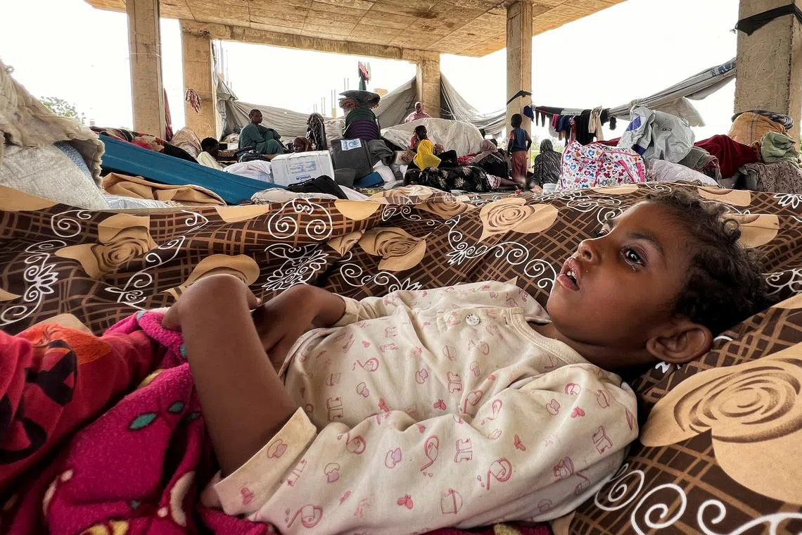 FILE PHOTO: Families displaced by RSF advances in Sudan's El Gezira and Sennar states shelter at the Omar ibn al-Khattab displacement site, Kassala state, Sudan, July 10, 2024. REUTERS/ Faiz Abubakr/File Photo