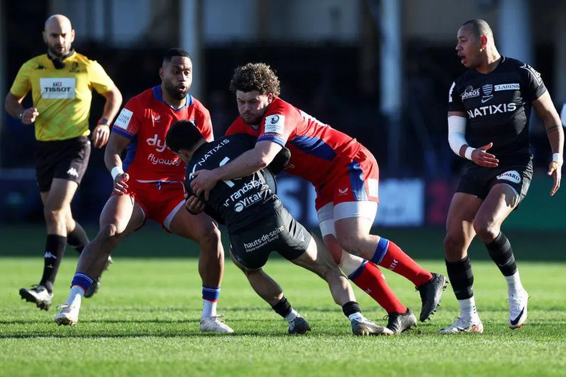 Rugby Union -  European Champions Cup - Pool Two - Bath v Racing 92 - The Recreation Ground, Bath, Britain - January 14, 2024 Bath's Alfie Barbeary in action with Racing 92's Max Spring Action Images via Reuters/Paul Childs/File Photo