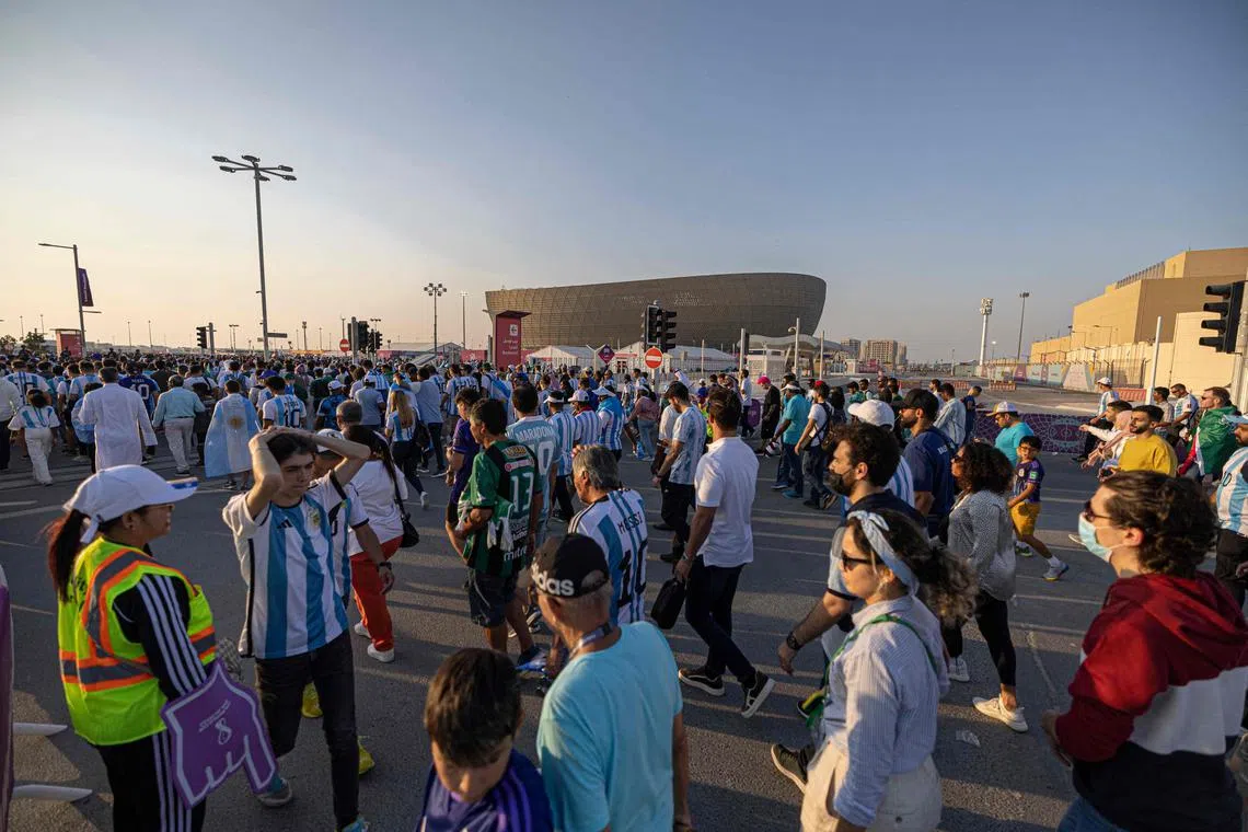 Fans leave Lusail Stadium after the Qatar 2022 World Cup Group C football match between Argentina and Saudi Arabia at the Lusail Stadium in Lusail, north of Doha on November 22, 2022. (Photo by Khaled DESOUKI / AFP)
