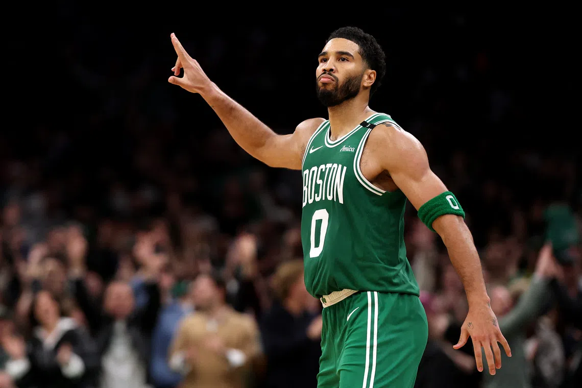 Jayson Tatum of the Boston Celtics celebrates against the New York Knicks.