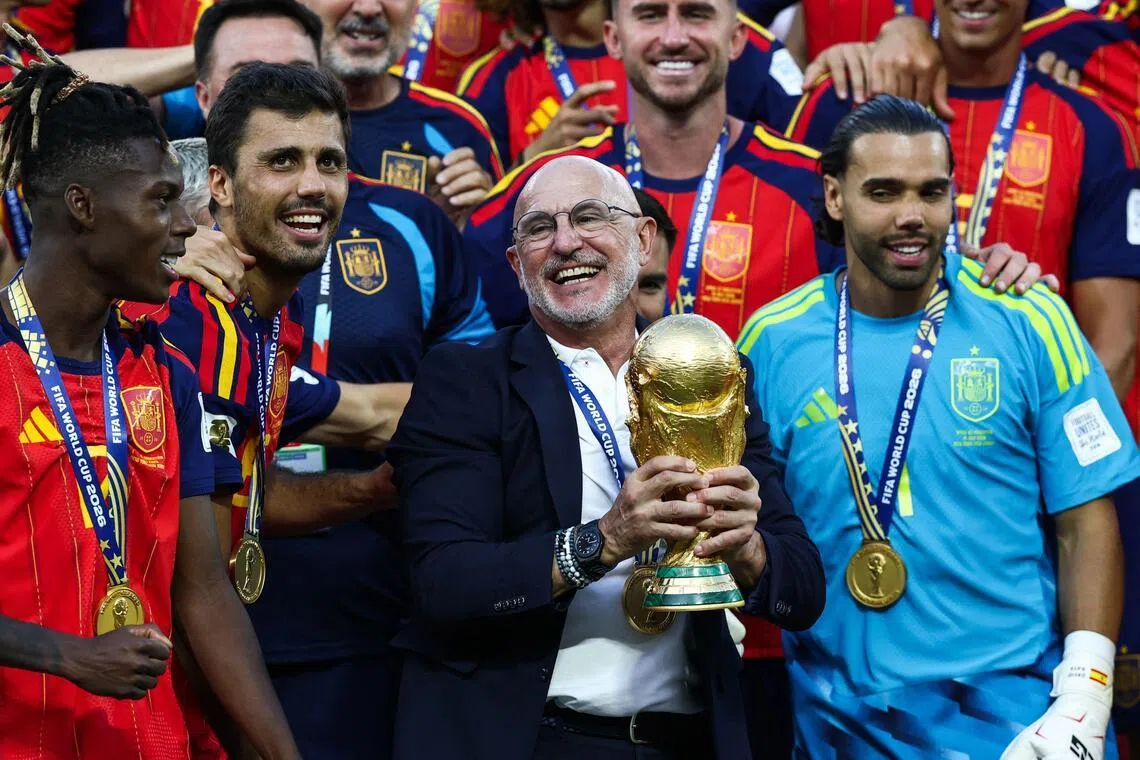 Spain’s head coach Luis de la Fuente holding the trophy after winning the 2026 World Cup final. The world champions are set to host the 2030 Cup.